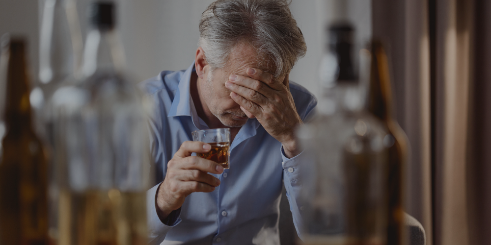 man with headache after drinking