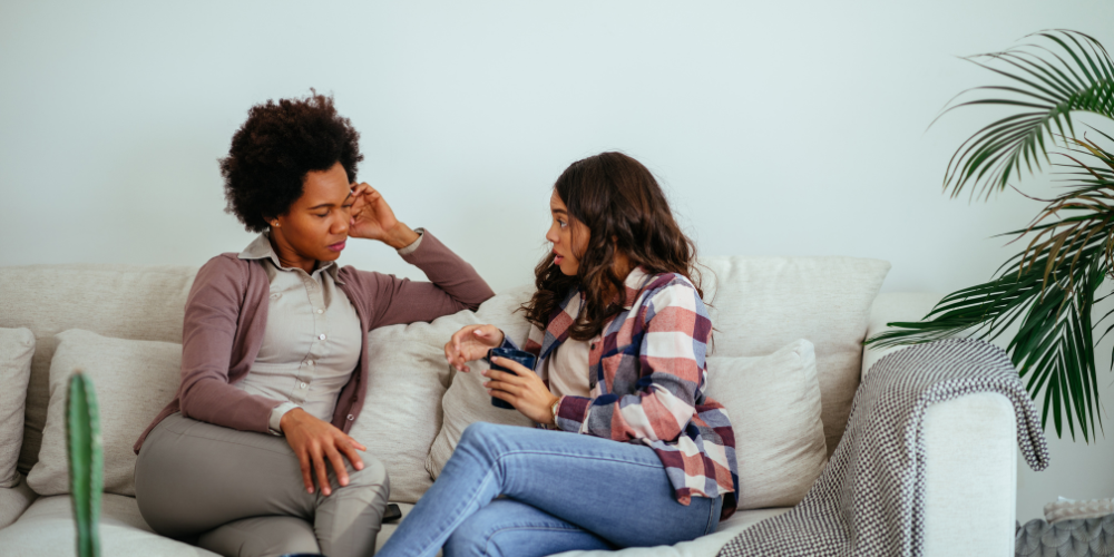 two women having a serious discussion