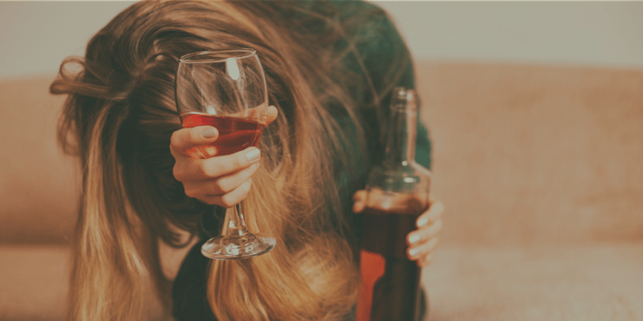 depressed woman drinking alcohol