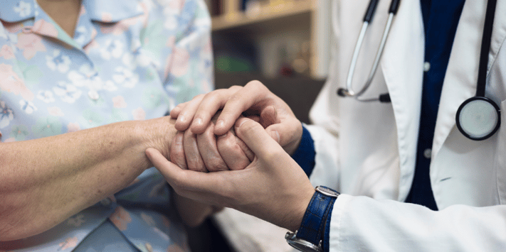 doctor comforting patient